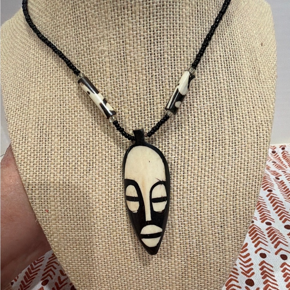 Handmade African bone mask Necklace
Unisex tribal 21”
